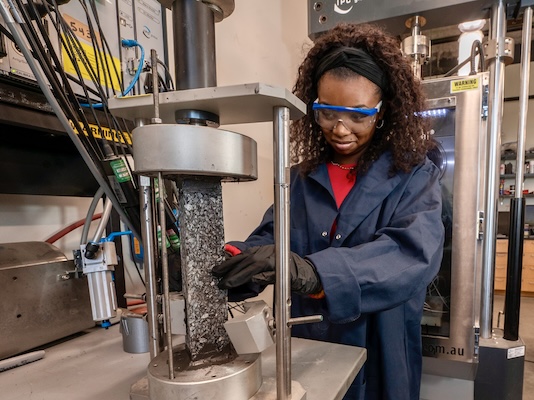 Student working in CREATES lab testing materials.